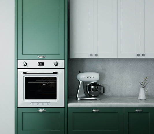 Shaker cabinets with silver hardware 